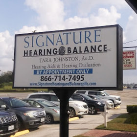 Signature Hearing & Balance sign